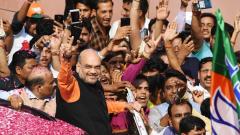 Amit Shah gestures to supporters during victory celebrations at BJP headquarters in New Delhi on May 23, 2019. AFP Photo Amit Shah gestures to supporters during victory celebrations at BJP headquarters in New Delhi on May 23, 2019. AFP Photo