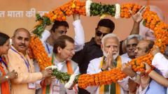 Prime Minister Narendra Modi being garlanded during an election campaign rally on the last day of the campaigning for the sixth phase of Lok Sabha polls, in Rohtak, on May 10, 2019. PTI Photo Prime Minister Narendra Modi being garlanded during an election campaign rally on the last day of the campaigning for the sixth phase of Lok Sabha polls, in Rohtak, on May 10, 2019. PTI Photo