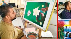 Ex-soldier paints a new life with his mouth Ex-soldier paints a new life with his mouth