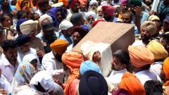 Toddler pulled out dead from borewell shaft, villagers bid tearful farewell Toddler pulled out dead from borewell shaft, villagers bid tearful farewell