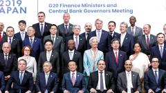 Japan's Finance Minister Taro Aso poses with delegations members for a family photo during the G20 Finance Ministers and Central Bank Governors Meeting in Fukuoka, Japan on June 9, 2019. Reuters Photo Japan's Finance Minister Taro Aso poses with delegations members for a family photo during the G20 Finance Ministers and Central Bank Governors Meeting in Fukuoka, Japan on June 9, 2019. Reuters Photo