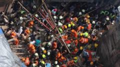 12 killed, over 40 feared trapped as Mumbai building collapses 12 killed, over 40 feared trapped as Mumbai building collapses