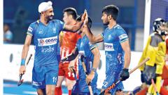Mandeep Singh (left) celebrates scoring a goal with Varun Kumar. Mandeep Singh (left) celebrates scoring a goal with Varun Kumar.