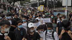Thousands rally to support Hong Kong police Thousands rally to support Hong Kong police