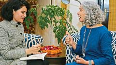 Vasudha Rai signs a copy of her book, Glow, for her reader Vasudha Rai signs a copy of her book, Glow, for her reader