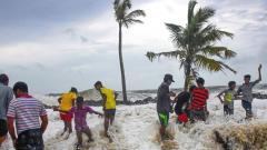 Boys play in the water as the Arabian Sea storms to the shores at Kannamaly near Kochi, on June 10, 2019. PTI Photo Boys play in the water as the Arabian Sea storms to the shores at Kannamaly near Kochi, on June 10, 2019. PTI Photo