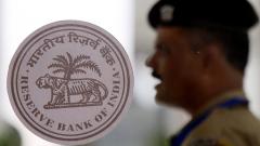 Admitting slowdown, RBI lowers growth forecast to 6.9% Admitting slowdown, RBI lowers growth forecast to 6.9%