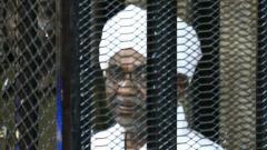 Sudan's ex-president Omar al-Bashir appears in court in the capital Khartoum on Saturday to face charges of illegal acquisition and use of foreign funds. Sudan's ex-president Omar al-Bashir appears in court in the capital Khartoum on Saturday to face charges of illegal acquisition and use of foreign funds.