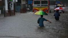 Heavy rain disrupts life for millions Heavy rain disrupts life for millions