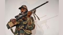 An Indian soldier shows a snipper gun during a press conference at the Army headquarters in Srinagar on Friday. An Indian soldier shows a snipper gun during a press conference at the Army headquarters in Srinagar on Friday.