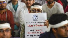 Members of Resident Doctors Association of AIIMS wearing bandages on their heads protest to show solidarity with their counterparts in West Bengal, in New Delhi, on June 14, 2019. PTI Photo Members of Resident Doctors Association of AIIMS wearing bandages on their heads protest to show solidarity with their counterparts in West Bengal, in New Delhi, on June 14, 2019. PTI Photo