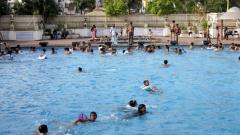 Eight-yr-old twins fall into swimming pool Eight-yr-old twins fall into swimming pool