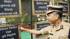 Pune Police Commissioner K Venkatesham reads a few of the signboards at the Commissioner’s Office in Camp, on Friday Pune Police Commissioner K Venkatesham reads a few of the signboards at the Commissioner’s Office in Camp, on Friday